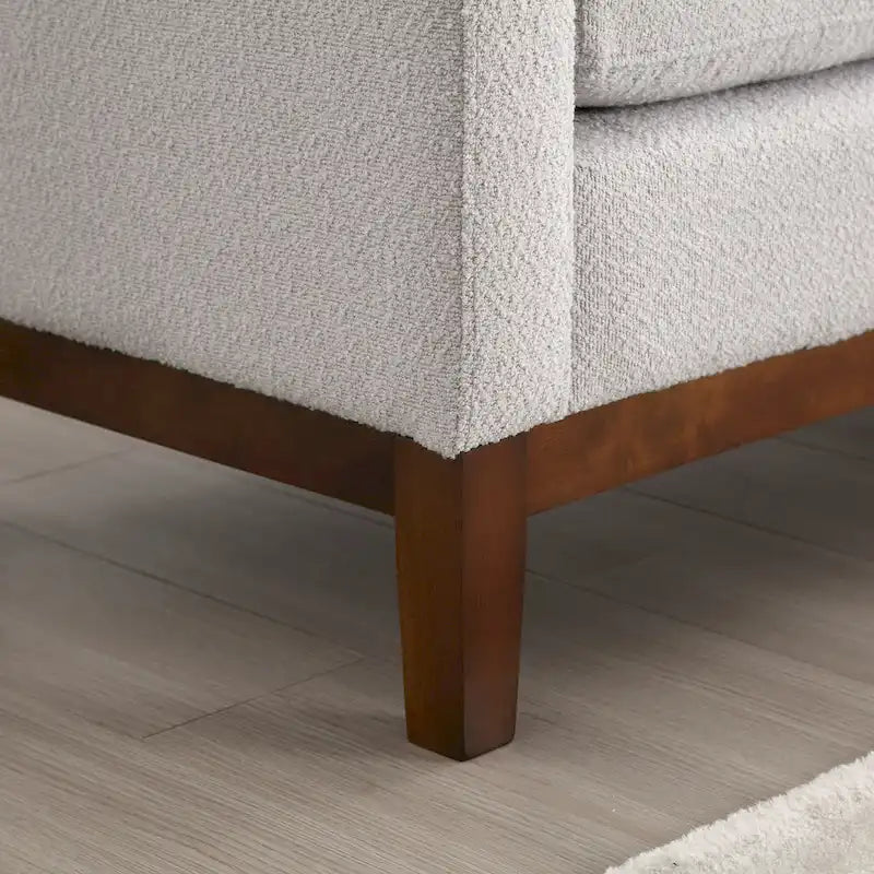 Banc rembourré pieds en bois et coussins traversins